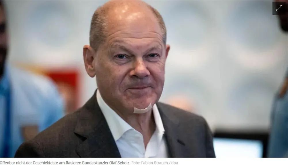 德国总理朔尔茨下巴贴创可贴亮相，剃须时割伤自己再次-ichn.eu | 人在欧洲